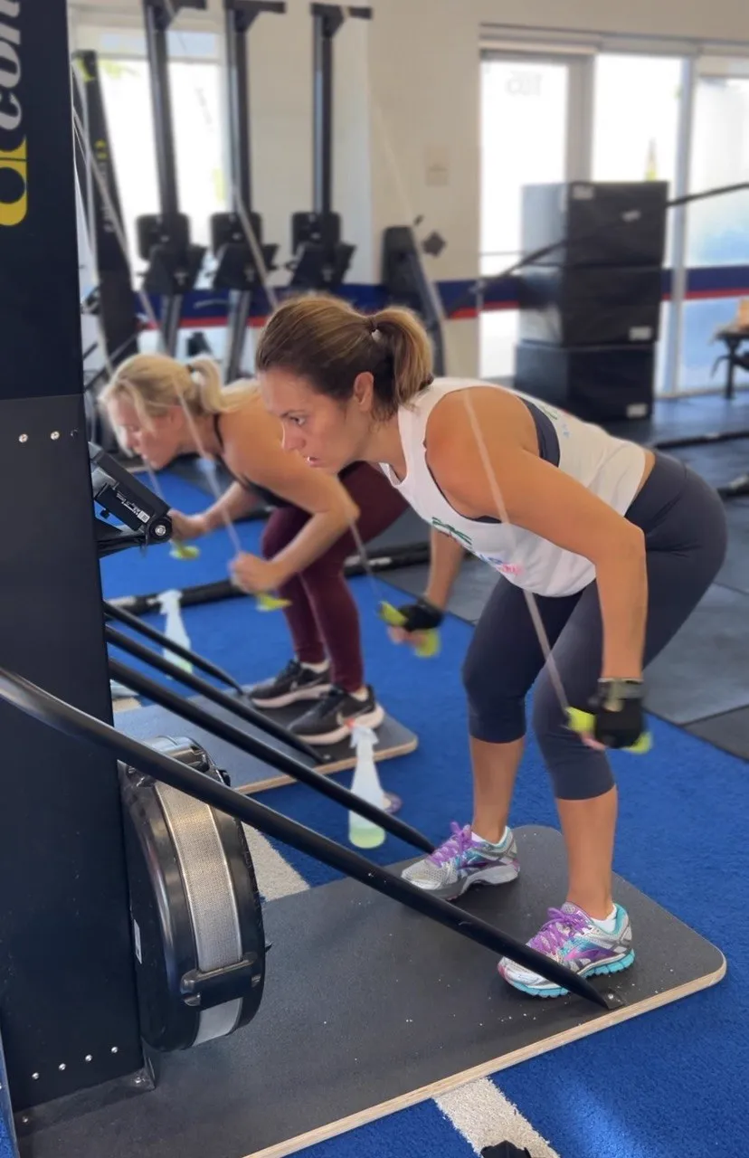 F45 Cooper City members training hard on the rowers